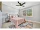 Serene bedroom featuring a plush bed, stylish decor, and a bright window view at 3902 11Th W Ave, Bradenton, FL 34205