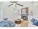 The bright living room showcases a fireplace, modern furnishings, and tasteful decor, creating an inviting gathering space at 3902 11Th W Ave, Bradenton, FL 34205