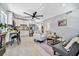 Bright living room with an open floor plan leading to the kitchen at 3902 11Th W Ave, Bradenton, FL 34205