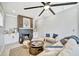 Inviting living room featuring a cozy fireplace and a stylish, comfortable seating area at 3902 11Th W Ave, Bradenton, FL 34205