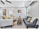 Cozy living room with natural light, comfortable seating, and stylish decor at 3902 11Th W Ave, Bradenton, FL 34205
