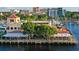 Waterfront restaurant on a pier with outdoor seating offering views of the city skyline at 3902 11Th W Ave, Bradenton, FL 34205