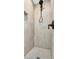 Modern bathroom shower features neutral tile surround and rainfall shower head at 3902 11Th W Ave, Bradenton, FL 34205