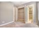 Bedroom with closet and doorway to the bathroom at 4020 Cascina Way, Sarasota, FL 34238