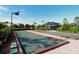 Enjoy a well-maintained bocce ball court, perfect for outdoor recreation and friendly competition at 4020 Cascina Way, Sarasota, FL 34238
