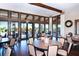 Inviting dining area featuring round tables, comfortable seating, and scenic views at 4020 Cascina Way, Sarasota, FL 34238