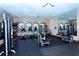 Well-equipped gym featuring treadmills, elliptical machines, and various weight-training stations at 4020 Cascina Way, Sarasota, FL 34238