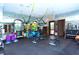 Bright gym with TRX suspension trainers, exercise balls, weights, and mirrored walls at 4020 Cascina Way, Sarasota, FL 34238