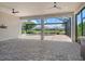 Spacious lanai overlooking the pool and backyard at 4020 Cascina Way, Sarasota, FL 34238