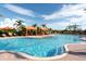 The community pool includes shady cabanas and lounge chairs, perfect for relaxing by the shimmering water at 4020 Cascina Way, Sarasota, FL 34238