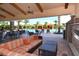 Enjoy a view of the pool with poolside seating, cabanas, and lush landscaping, ideal for relaxation and entertainment at 4020 Cascina Way, Sarasota, FL 34238