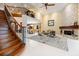 Large open-concept living space with staircase and dining area at 7716 Club Ln, Sarasota, FL 34238