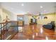 Spacious living area with gleaming hardwood floors and a comfortable seating area at 7716 Club Ln, Sarasota, FL 34238