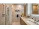 Contemporary bathroom with a glass shower and granite countertops at 1774 10Th St, Sarasota, FL 34236