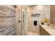Modern bathroom featuring a glass shower and marble tile at 1774 10Th St, Sarasota, FL 34236