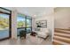 Bright living room with a large window, comfortable seating, and modern decor at 1774 10Th St, Sarasota, FL 34236