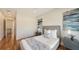 Comfortable main bedroom featuring hardwood floors and stylish decor at 1774 10Th St, Sarasota, FL 34236