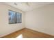 Bright bedroom featuring hardwood floors and a window with scenic views at 1778 10Th St, Sarasota, FL 34236