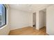Bright bedroom featuring hardwood floors, recessed lighting and an en suite bath at 1778 10Th St, Sarasota, FL 34236