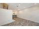 Bright living area with tiled floors leading to a modern kitchen with stone countertop at 1778 10Th St, Sarasota, FL 34236
