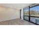 Open living area with tiled floors and large windows offering ample natural light at 1778 10Th St, Sarasota, FL 34236