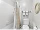 Clean bathroom with a shower, toilet, and towel rack at 542 Lakeside Dr # 542, Bradenton, FL 34210