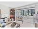 Cozy living area with sliding glass doors and stylish furniture, perfect for relaxing and entertaining at 542 Lakeside Dr # 542, Bradenton, FL 34210
