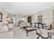 Spacious living room with a comfortable sofa, elegant lamps, and tasteful decor, creating a relaxing atmosphere at 542 Lakeside Dr # 542, Bradenton, FL 34210