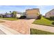 Inviting single Gathering home featuring a well maintained yard and beautiful brick driveway at 6247 Champions Row St, Bradenton, FL 34210