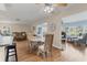 Spacious living and dining rooms with beautiful wood floors in an open floor plan at 7304 11Th W Ave, Bradenton, FL 34209