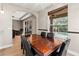 Dining room with a view of the backyard pool area and backyard patio at 1269 Western Pine Cir, Sarasota, FL 34240