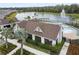 Aerial view of community pool and lake at 13891 Heartwood Way, Parrish, FL 34219