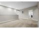 Upstairs carpeted hallway with neutral walls and recessed lighting leading to other rooms of the home at 13891 Heartwood Way, Parrish, FL 34219