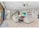 Comfortable living room showcases stylish decor, wood-look flooring, and easy access to the staircase at 13891 Heartwood Way, Parrish, FL 34219