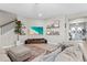 Relaxing living room featuring comfortable furniture, decor, and a staircase leading to the upper level at 13891 Heartwood Way, Parrish, FL 34219