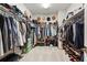 Spacious walk-in closet with shelving, rods, and ample storage for clothing and accessories at 13891 Heartwood Way, Parrish, FL 34219