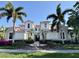 Charming two-story home with a red tile roof, featuring meticulously landscaped grounds at 9606 Sea Turtle Ter # 101, Bradenton, FL 34212