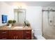 Bathroom with modern finishes, a tiled shower, and granite countertop at 101 S Gulfstream Ave # 10E, Sarasota, FL 34236
