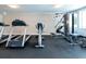 Well-equipped gym featuring treadmills, stationary bikes, and a multi-station weight machine at 101 S Gulfstream Ave # 10E, Sarasota, FL 34236