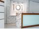 A modern lobby features marble accents and a reception desk for residents and guests at 101 S Gulfstream Ave # 10E, Sarasota, FL 34236