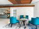 Comfortable lobby with stylish seating, textured walls, glass table, and modern decor for a welcoming atmosphere at 101 S Gulfstream Ave # 10E, Sarasota, FL 34236