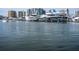 Impressive display of luxury yachts berthed in the marina, complemented by modern buildings in the background at 101 S Gulfstream Ave # 10E, Sarasota, FL 34236
