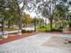 Peaceful park featuring mature trees, benches, and walkways offering a serene outdoor setting at 101 S Gulfstream Ave # 10E, Sarasota, FL 34236