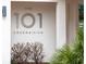 Signage for the 101 Condominium is easily visible from the street at 101 S Gulfstream Ave # 10E, Sarasota, FL 34236