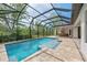 Relaxing screened-in pool area with plenty of room for outdoor dining and lounging at 11323 Rivers Bluff Cir, Lakewood Ranch, FL 34202