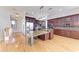 Gourmet kitchen with granite countertops, stainless steel appliances, and custom cabinetry at 1825 Bayshore Dr, Terra Ceia, FL 34250