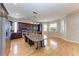 Spacious kitchen with stainless steel appliances, granite countertops, and lots of natural light at 1825 Bayshore Dr, Terra Ceia, FL 34250