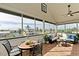 The screened lanai provides plenty of comfortable seating and neighborhood views at 1825 Bayshore Dr, Terra Ceia, FL 34250