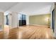 Bright Living room with hardwood floors and access to the Lanai at 304 Pine Run Dr, Osprey, FL 34229