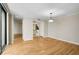 Spacious Living room with hardwood floors and view to the Kitchen at 304 Pine Run Dr, Osprey, FL 34229